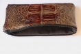 Trousse / pochette marron en simili cuir cobra avec intérieur en suédine noire