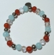Bracelet en perles naturelles 6 mm : pierre de mer bleue, cristal de roche, agate rouge