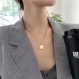 Collier chaine multirang en acier inoxydable pendentif rond et barre chic doré de qualité pour femme