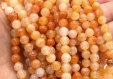 Perles d'agate craquelée naturelle rondes orange grade a  Ø6mm/Ø8mm - lot de 20/40 unités réf:b3000000-