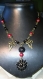 Joli collier metal bronze perles rouges et noires
