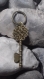 Porte clés original en forme de clé note de musique 
