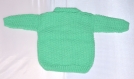 Petit pull polo vert à motifs bébé tricoté main taille 12 mois