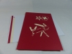Carte couteau suisse couverture en kirigami couleur rouge groseille et ivoire