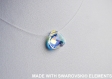 Swarovski  collier avec pendentif poire crystal ab sur fil nylon
