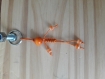 Porte clés petit bonhomme en perles orange