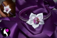 Serre tete à perles violettes et fleur satin blanche la reine des neiges (ref n-47-a)