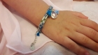 Bracelet liberty bleu goutte d'eau et ses pompons
