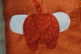 Couverture bébé avec éléphants, tons orangés