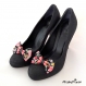 Clips chaussure noeud noir fleuri rose et pois.