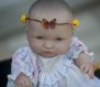 Couronne de fleurs cheveux modèle papillon pour bébé, peluche ou poupée