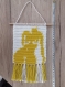Tapis woman in yellow