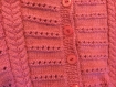 Veste rose ajourée tricotée main pour bébé taille 6 mois